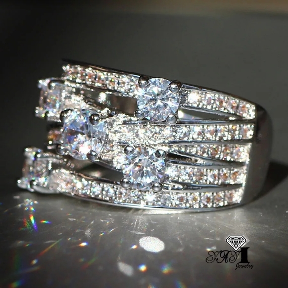Jewelry - Brand new Shiny silver filled white sapphire ring